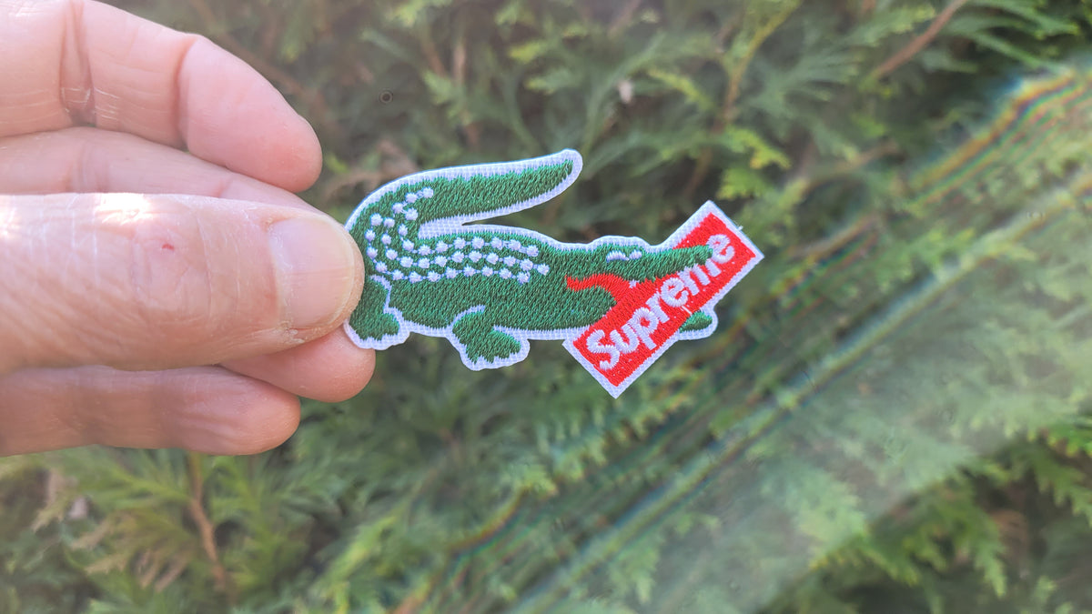 Lacoste supreme shop logo