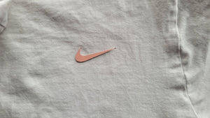 Pink Nike Swoosh logo leather iron on patch